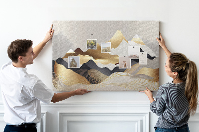 Tablero de anuncios montañas doradas sobre un fondo gris