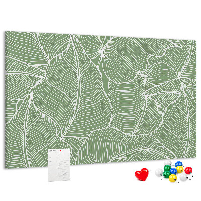 Pizarra de corcho con diseño de hojas y líneas delicadas