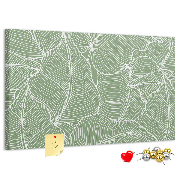 Pizarra de corcho con diseño de hojas y líneas delicadas
