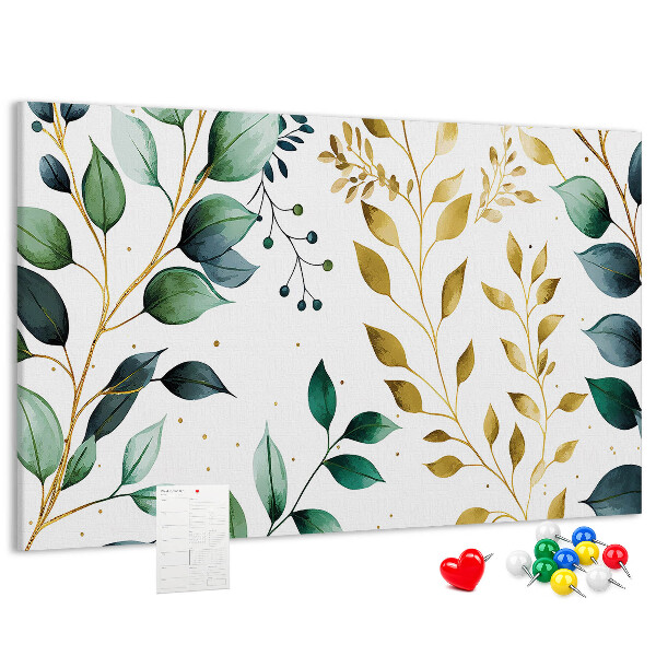 Tablero de corcho decorativo con diseño de hojas doradas sobre fondo claro