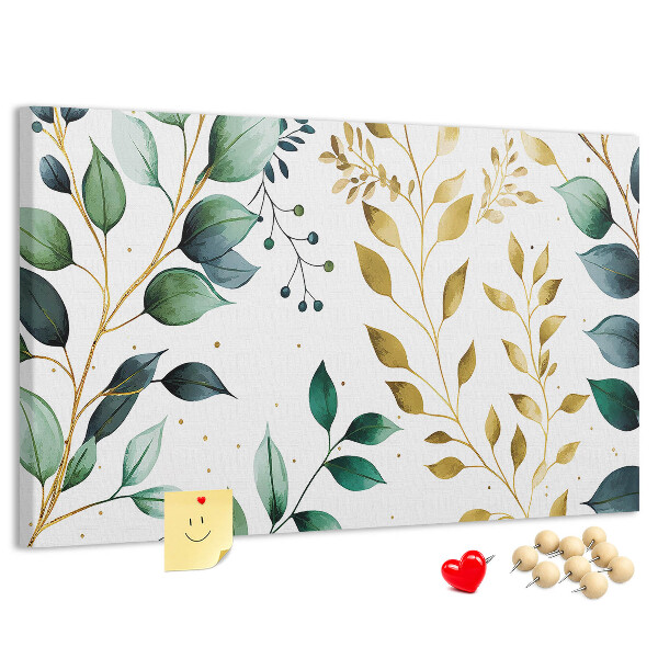 Tablero de corcho decorativo con diseño de hojas doradas sobre fondo claro