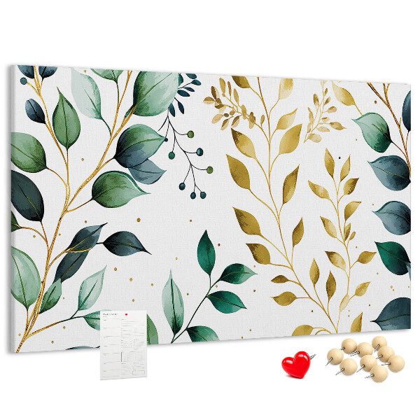 Tablero de corcho decorativo con diseño de hojas doradas sobre fondo claro