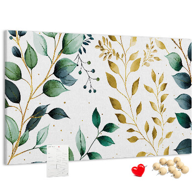 Tablero de corcho decorativo con diseño de hojas doradas sobre fondo claro