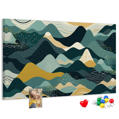 Tablero de corcho decorado con patrones abstractos de paisajes montañosos en colores