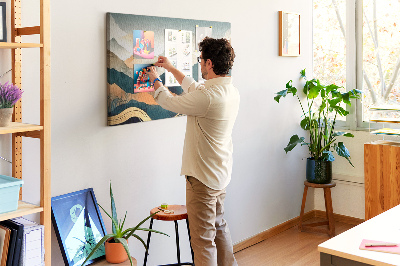 Tablero de corcho decorativo con diseño de paisaje montañoso en tonos apagados
