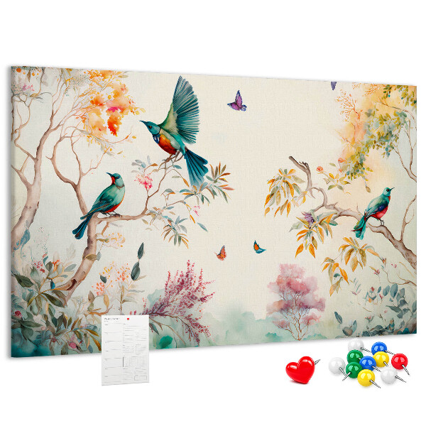 Pizarra de corcho con diseño de pájaros coloridos en un paisaje primaveral