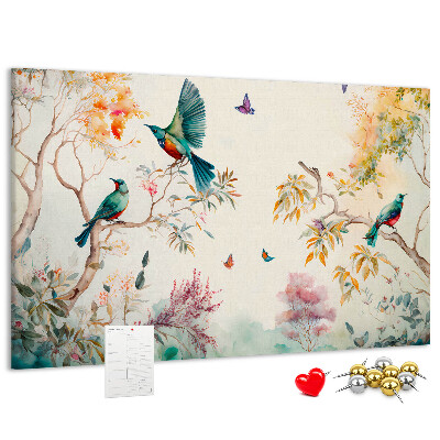 Pizarra de corcho con diseño de pájaros coloridos en un paisaje primaveral