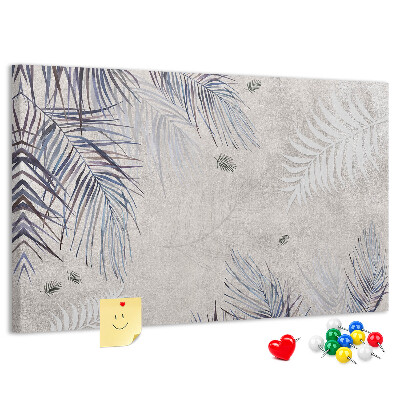 Tablero de anuncios hojas delicadas sobre fondo gris