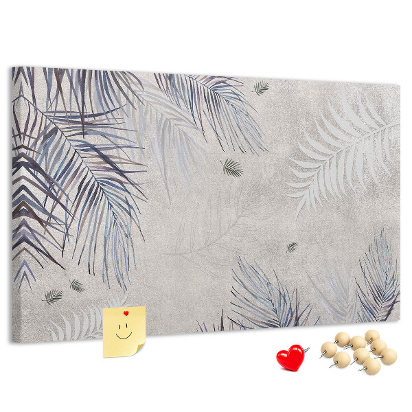 Tablero de anuncios hojas delicadas sobre fondo gris