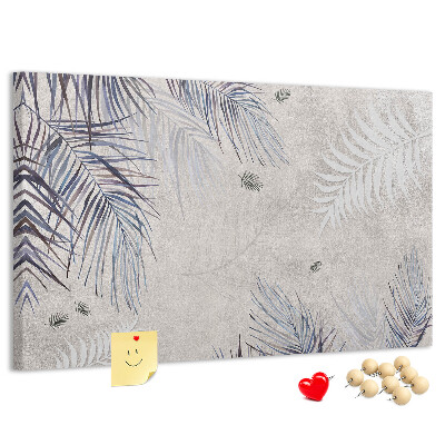 Tablero de anuncios hojas delicadas sobre fondo gris