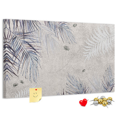 Tablero de anuncios hojas delicadas sobre fondo gris
