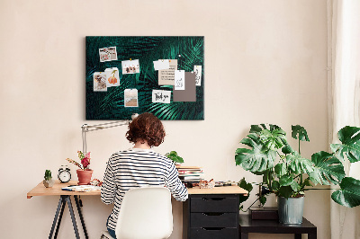 Tablero de anuncios diseño de hojas tropicales en tonos verdes
