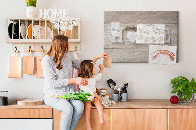 Tablero de corcho decorativo con elegante inscripción HOME y un corazón