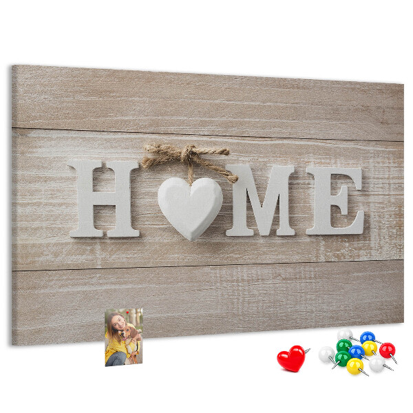 Tablero de corcho decorativo con elegante inscripción HOME y un corazón