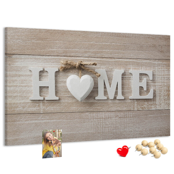 Tablero de corcho decorativo con elegante inscripción HOME y un corazón