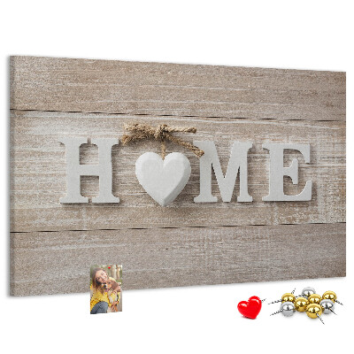 Tablero de corcho decorativo con elegante inscripción HOME y un corazón