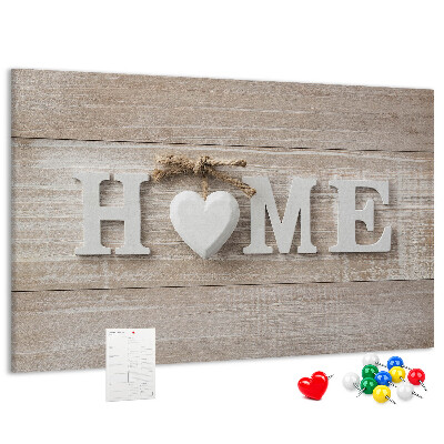 Tablero de corcho decorativo con elegante inscripción HOME y un corazón