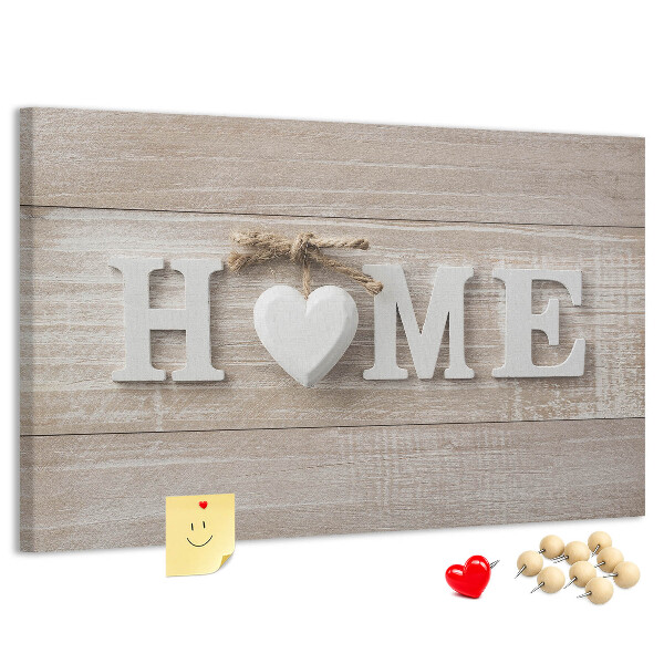 Tablero de corcho decorativo con elegante inscripción HOME y un corazón