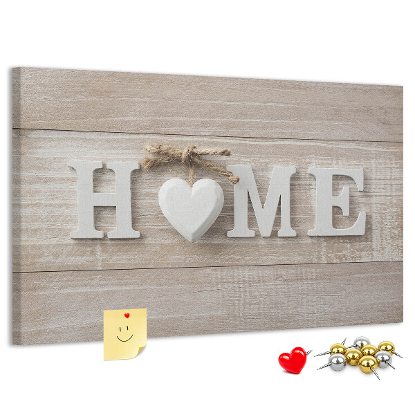 Tablero de corcho decorativo con elegante inscripción HOME y un corazón