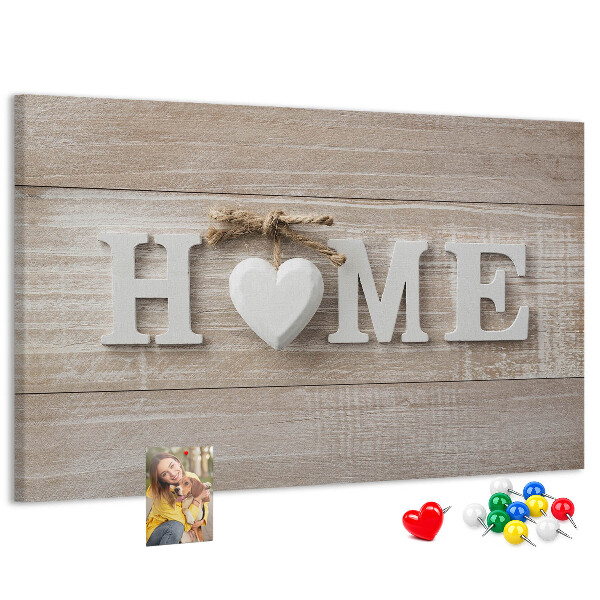 Tablero de corcho decorativo con elegante inscripción HOME y un corazón