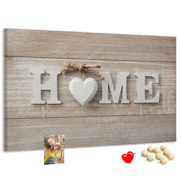 Tablero de corcho decorativo con elegante inscripción HOME y un corazón