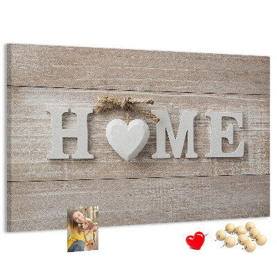 Tablero de corcho decorativo con elegante inscripción HOME y un corazón