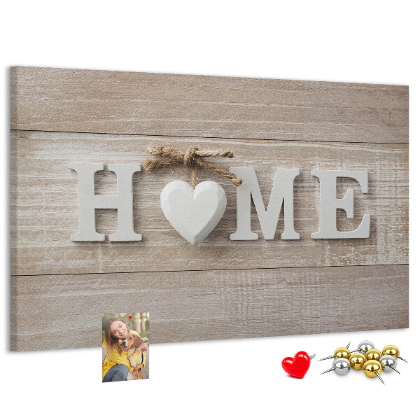 Tablero de corcho decorativo con elegante inscripción HOME y un corazón