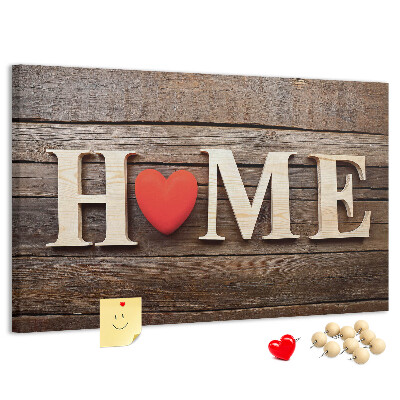 Tablero de anuncios con letras de madera y fondo de corazón