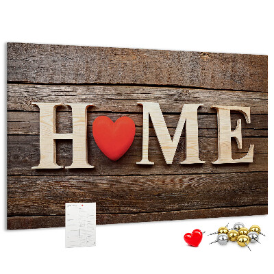 Tablero de anuncios con letras de madera y fondo de corazón
