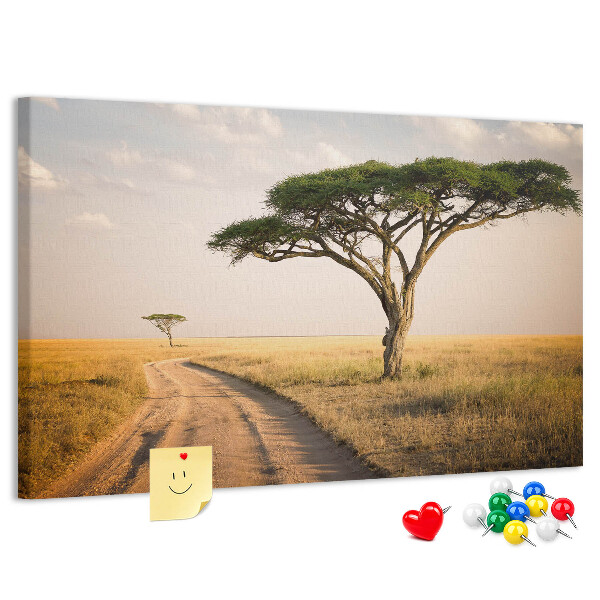 Pizarra de corcho con diseño de paisaje africano y un árbol