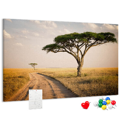 Pizarra de corcho con diseño de paisaje africano y un árbol