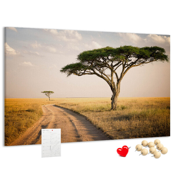 Pizarra de corcho con diseño de paisaje africano y un árbol