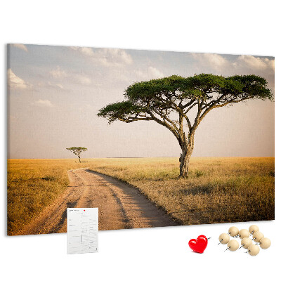 Pizarra de corcho con diseño de paisaje africano y un árbol