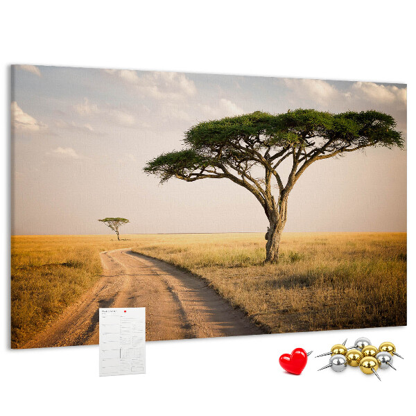 Pizarra de corcho con diseño de paisaje africano y un árbol