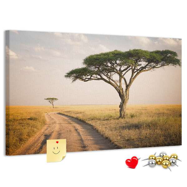 Pizarra de corcho con diseño de paisaje africano y un árbol