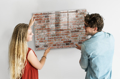 Pizarra borrable de cristal con imanes Tablero de fotos en una pared de ladrillos