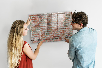 Pizarra borrable de cristal con imanes Tablero de fotos en una pared de ladrillos