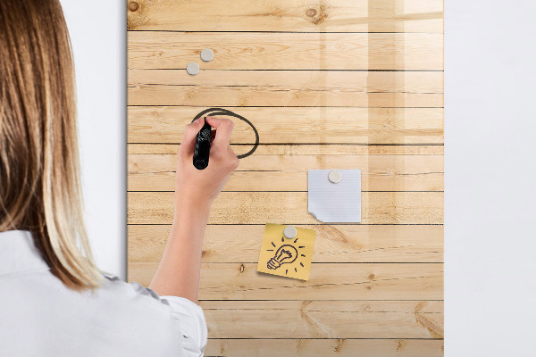 Pizarra magnética de pared con rotulador Tablero de notas sobre un fondo de madera