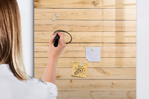 Pizarra magnética de pared con rotulador Tablero de notas sobre un fondo de madera