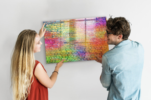 Pizarra magnética de pared con rotulador Una pared colorida con espacio para fotos.