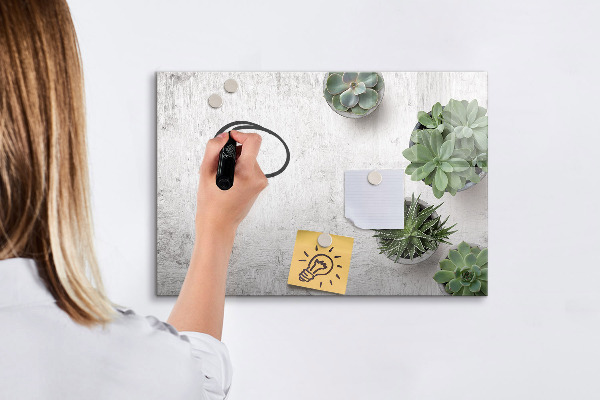 Pizarra borrable de cristal con imanes Un elegante tablero para presentar fotos.