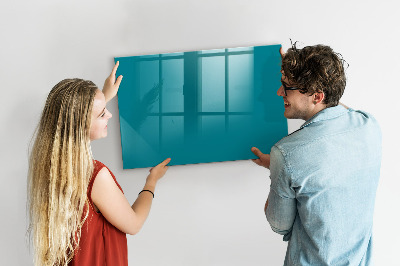 Pizarra borrable de cristal con imanes Un tablero colorido para notas y fotos.