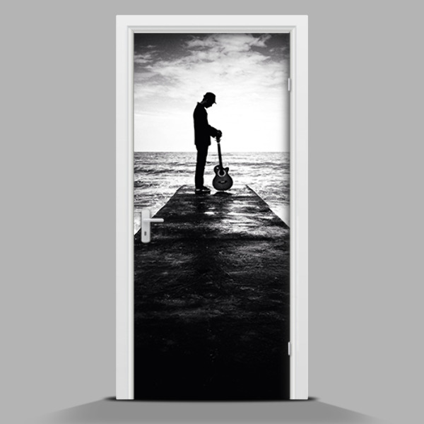 Vinilo para forrar puerta Hombre con una guitarra