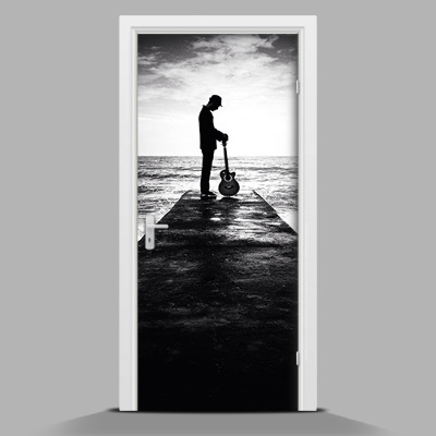 Vinilo para forrar puerta Hombre con una guitarra