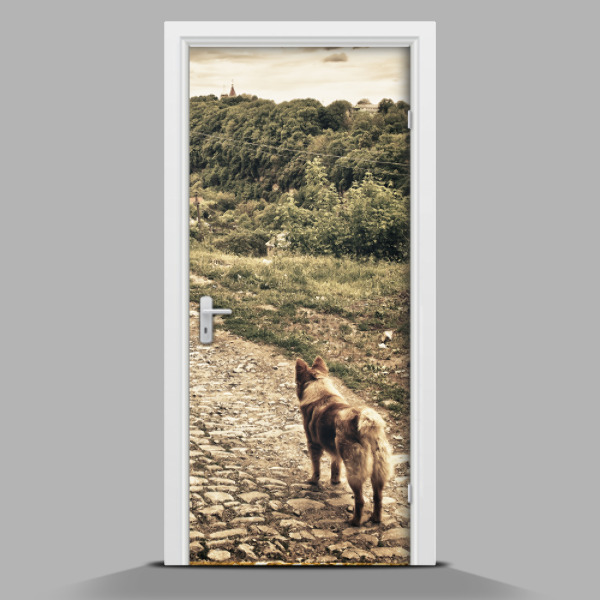 Papel adhesivo para puerta Un perro en las montañas