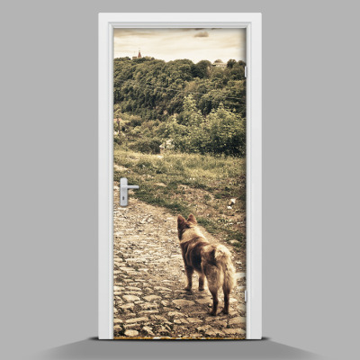 Papel adhesivo para puerta Un perro en las montañas