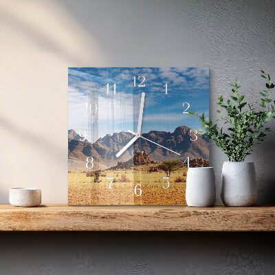 Reloj cuadrado montañas