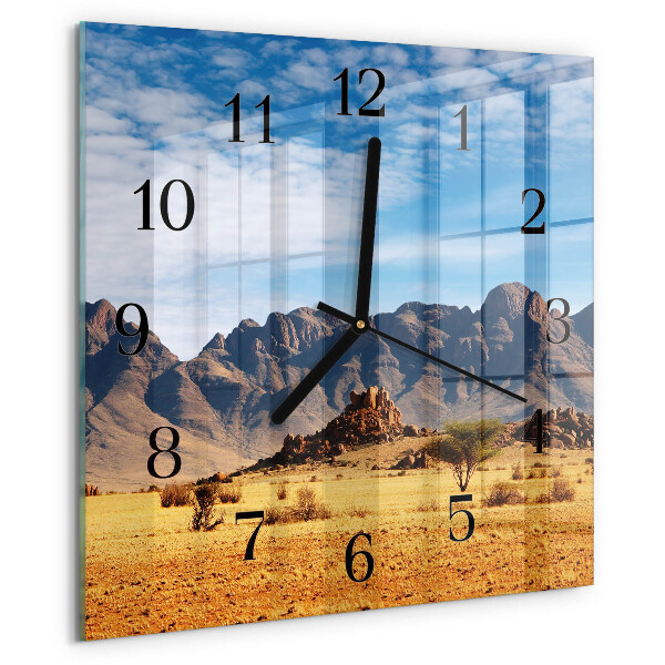 Reloj de vidrio montañas
