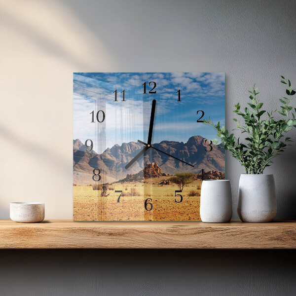 Reloj de vidrio montañas