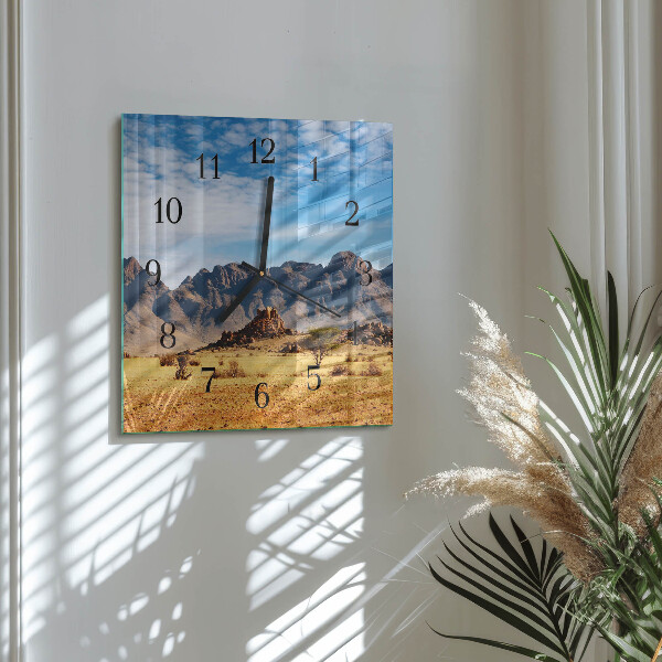 Reloj de vidrio montañas